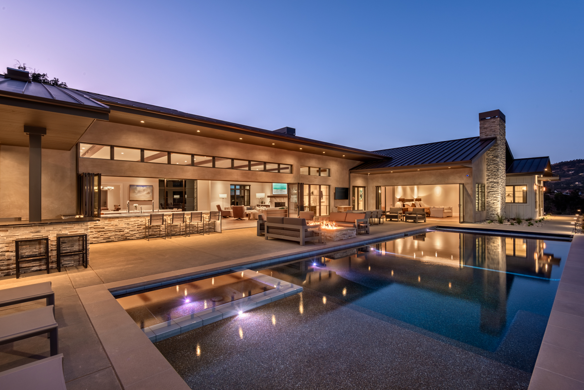 Quietwater Ridge exterior at dusk with hillside views